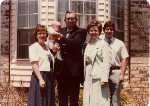 Pop in the middle is holding me as a baby. My grandmother, uncle and mother are also here.